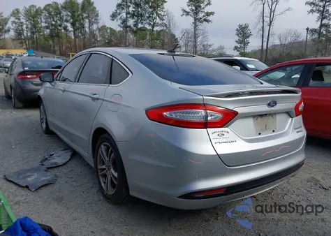 2015 Ford Fusion Hybrid Titanium z USA, uszkodzony, nr VIN 3FA6P0RU4FR197684